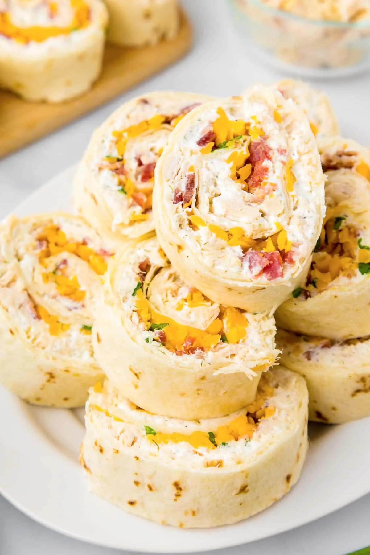 These chicken bacon ranch pinwheels are quick to make and always disappear fast. Using canned chicken keeps things easy, while the combo of crispy bacon, creamy ranch, and cheddar cheese packs big flavor into every bite. Perfect as an appetizer, snack, or easy party food when you need something crowd-pleasing without a lot of effort.