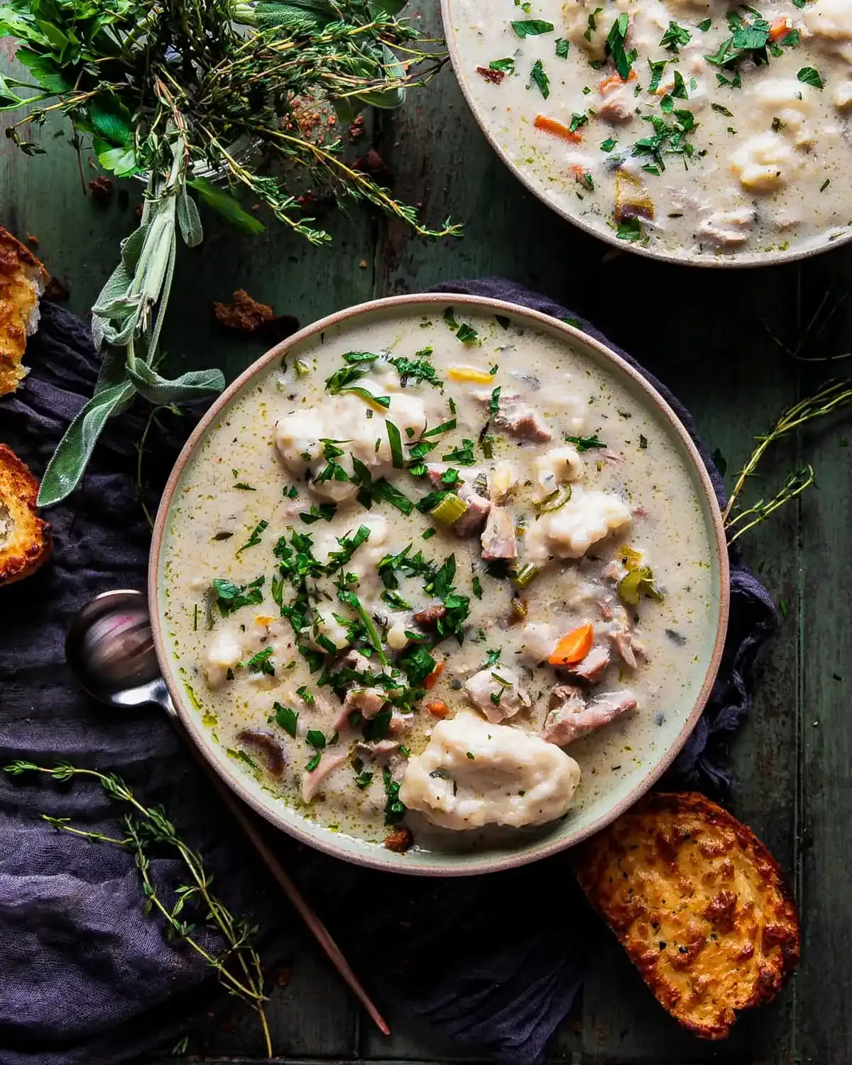 Nothing says comfort quite like a bowl of chicken and dumplings, and this version is pure Southern cozy. Tender chicken thighs, soft veggies, and plenty of herbs simmer in a creamy broth, and then you drop in those light, fluffy dumplings that make everyone at the table smile. It’s warm, soothing, and honestly feels like a big hug on the coldest nights.