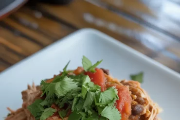 🌶️✨ Flavor-packed, juicy, and effortlessly easy! This Slow Cooker Mexican Shredded Chicken is a go-to recipe for burrito bowls, tacos, lettuce wraps, and more. Made with tender chicken thighs, fire-roasted tomatoes, smoky spices, and a squeeze of fresh lime—it's the perfect make-ahead meal for busy weeknights or meal prep. #SlowCookerChicken #MexicanShreddedChicken #EasyDinnerIdeas #MealPrepRecipes #BurritoBowl
