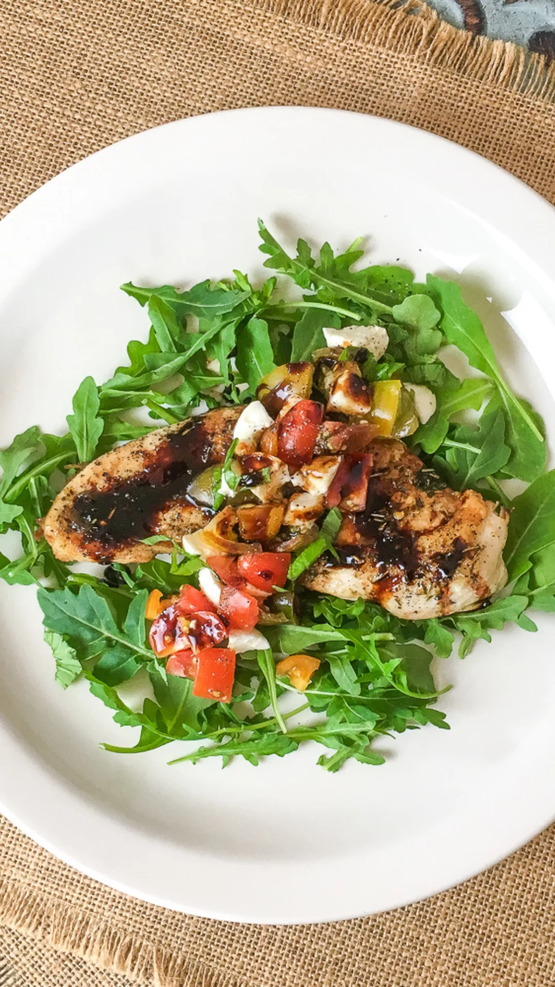 This quick and easy Mozzarella Butterflied Chicken brings all the flavors of a Caprese salad to the dinner table—juicy chicken, fresh tomatoes, creamy mozzarella, and a sweet balsamic glaze. Ready in just 20 minutes! #CapreseChicken #EasyChickenDinner #WeeknightMeals #MozzarellaChicken #BalsamicGlaze