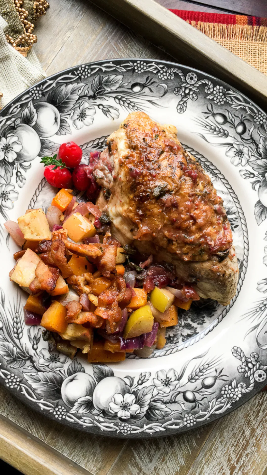Celebrate the season with this cozy and flavorful Cranberry Orange Chicken. Crispy bone-in chicken breasts roast in a sweet-tart sauce made with cranberries, orange juice, and winter spices—all in one pan. Great for entertaining or a seasonal family meal. #WinterRecipes #ChickenDinner #CranberryOrange #ComfortFood #EasyRoastedChicken