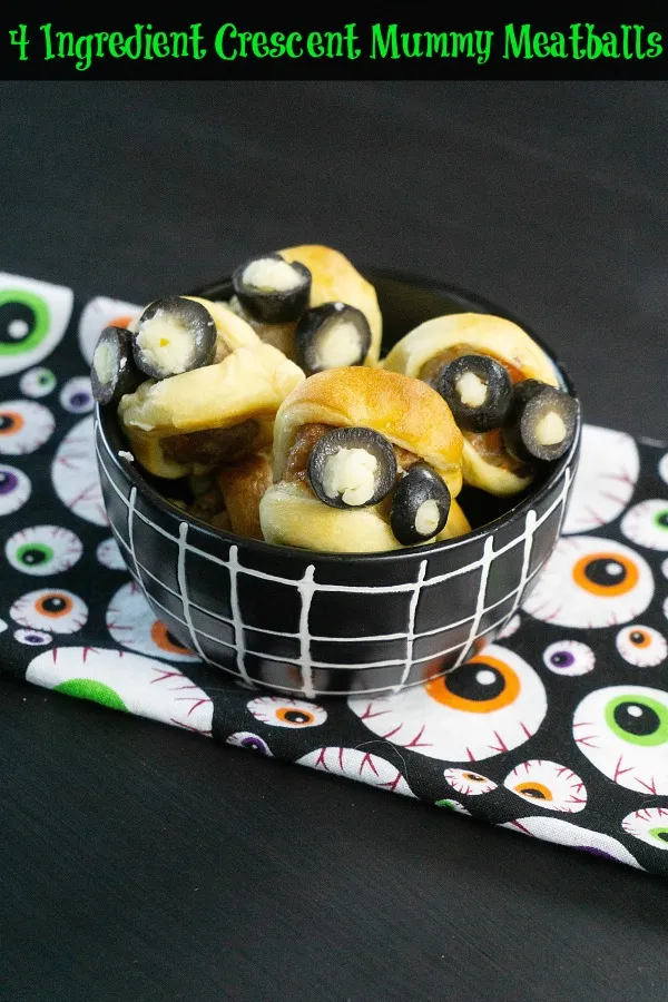 With just a few simple ingredients, these adorable savory mummies come together fast and disappear even faster. Perfect as a warm party snack or spooky appetizer that'll have everyone reaching for more.