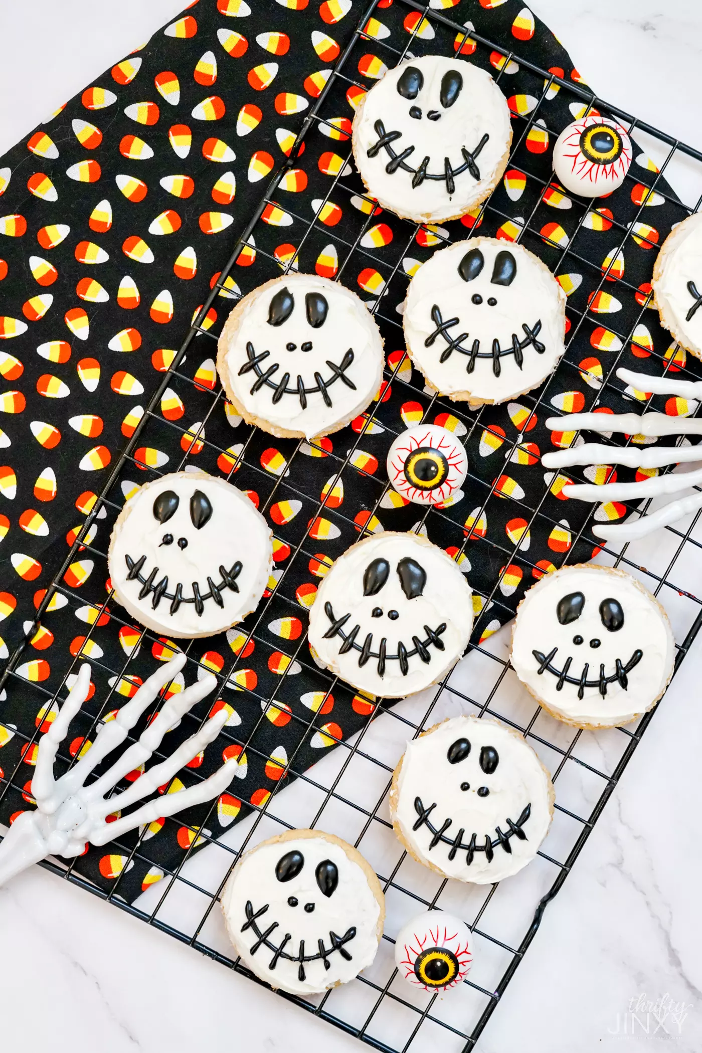 Channeling The Nightmare Before Christmas vibe, these cookies feature Jack’s signature stitched smile. They’re simple to decorate with black icing and make a spook-tacular statement on your cookie tray.
