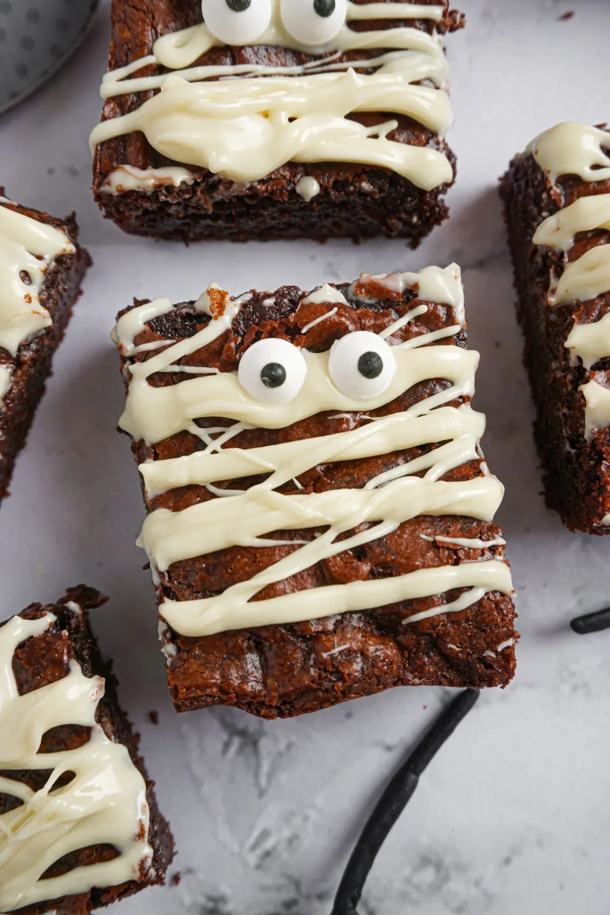 Rich, fudgy brownies are topped with white chocolate "bandages" and candy eyes for a treat that’s more cute than creepy. These mummy bars are a fun twist on your favorite chocolate dessert.